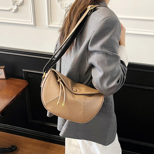 👜 Minimalistická crossbody kabelka Dumpling – štýl a praktickosť v jednom