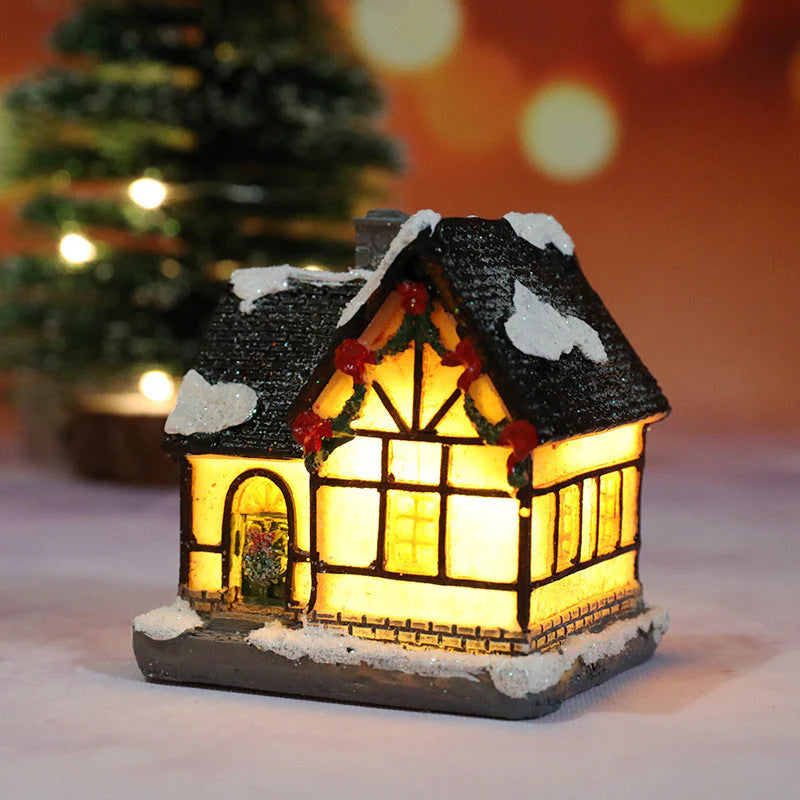 Miniatúrny LED osvetlený vianočný domček