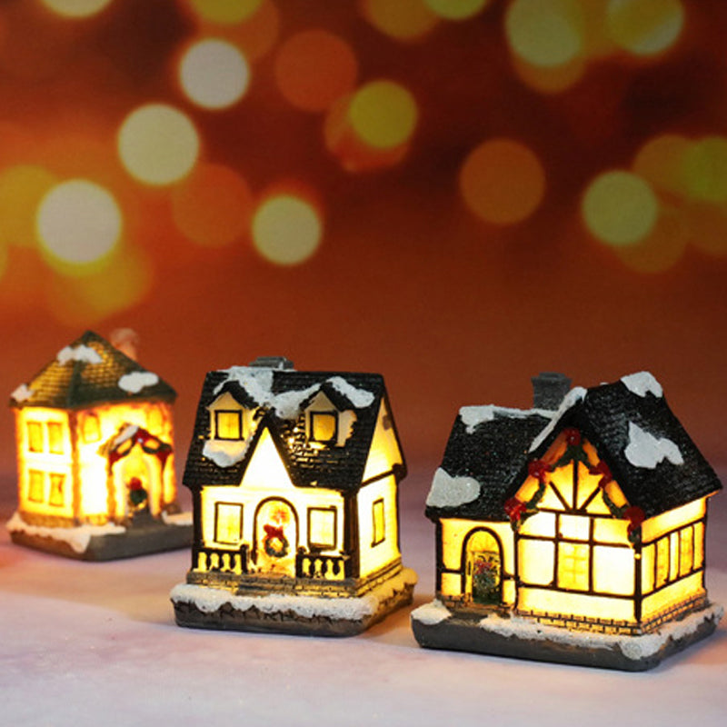 Miniatúrny LED osvetlený vianočný domček