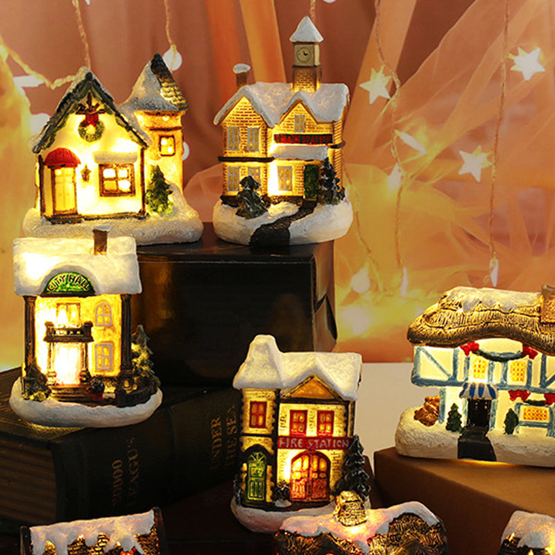 Miniatúrny LED osvetlený vianočný domček