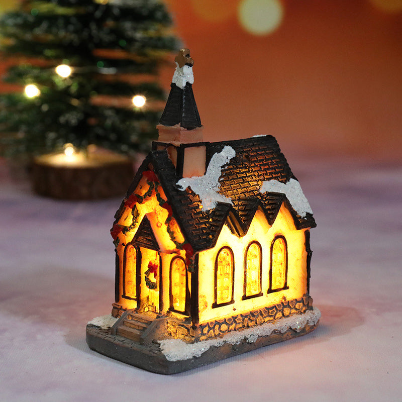 Miniatúrny LED osvetlený vianočný domček