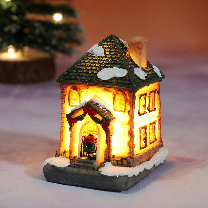 Miniatúrny LED osvetlený vianočný domček