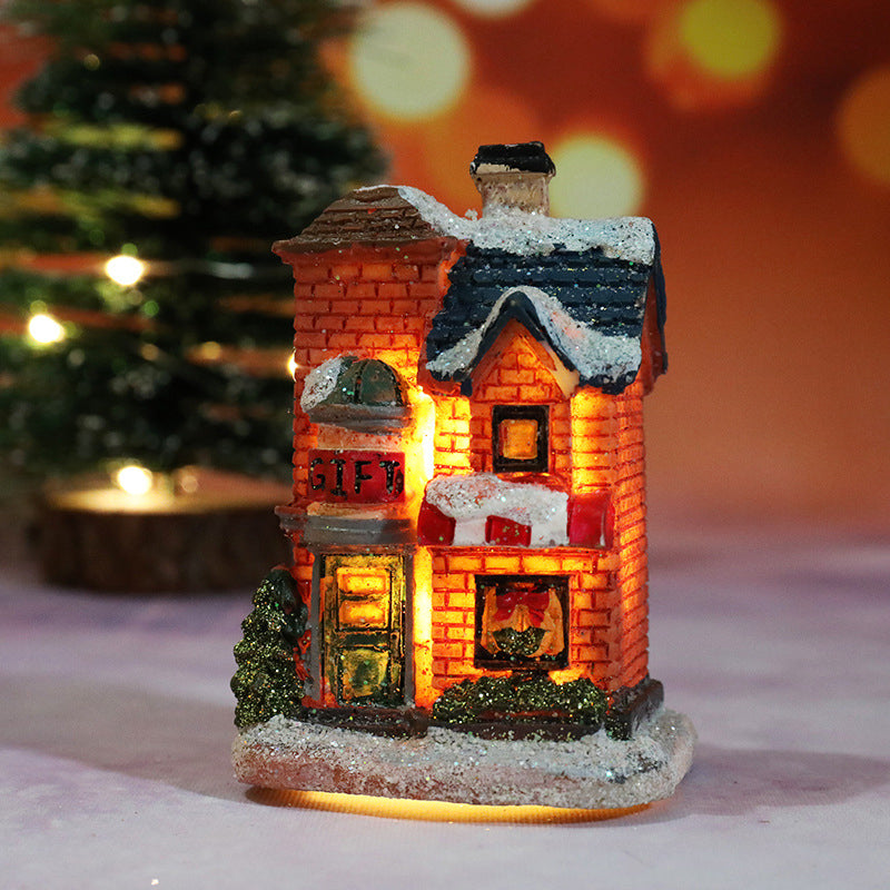 Miniatúrny LED osvetlený vianočný domček
