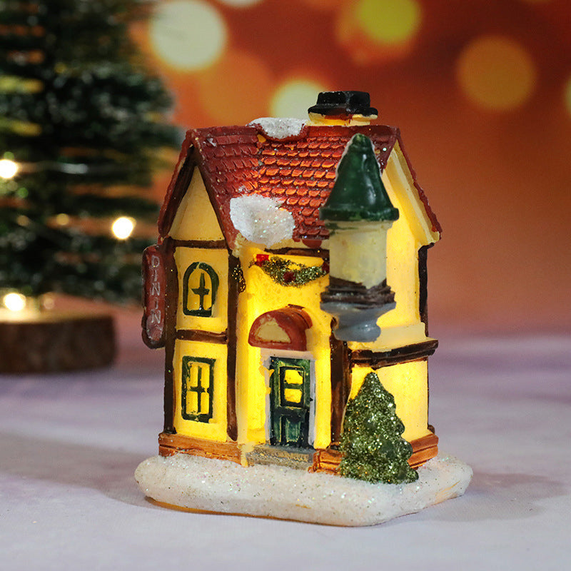 Miniatúrny LED osvetlený vianočný domček