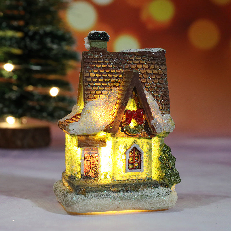 Miniatúrny LED osvetlený vianočný domček