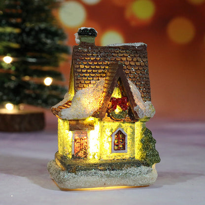 Miniatúrny LED osvetlený vianočný domček